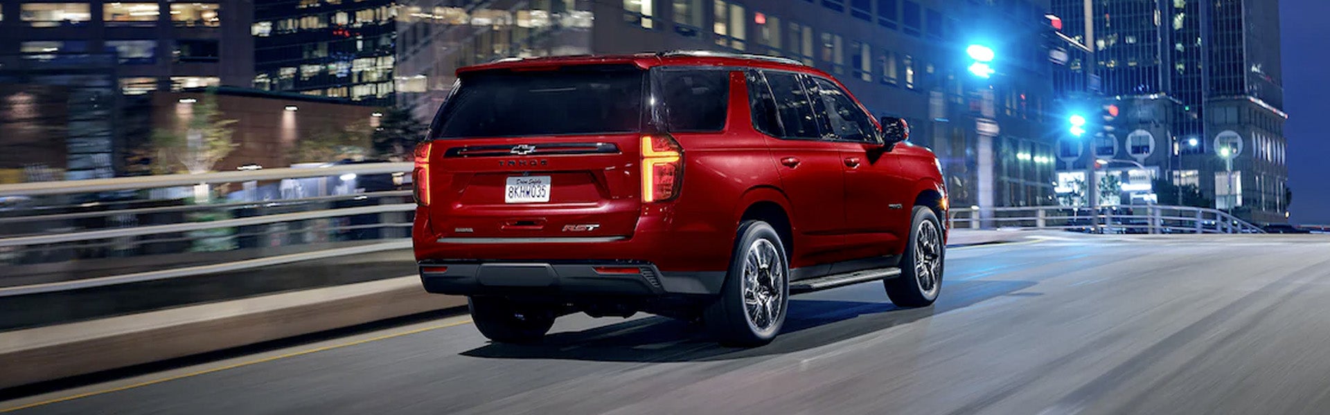 back view of red chevy tahoe