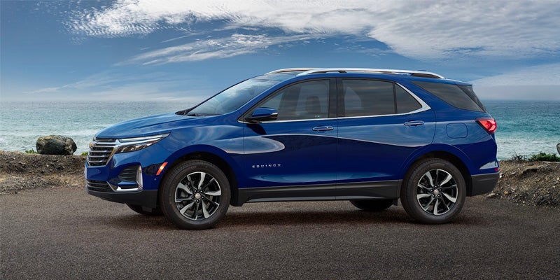 side view of blue Chevy Equinox