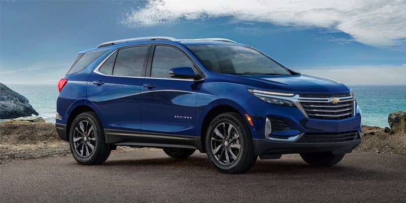 side view of blue Chevy Equinox