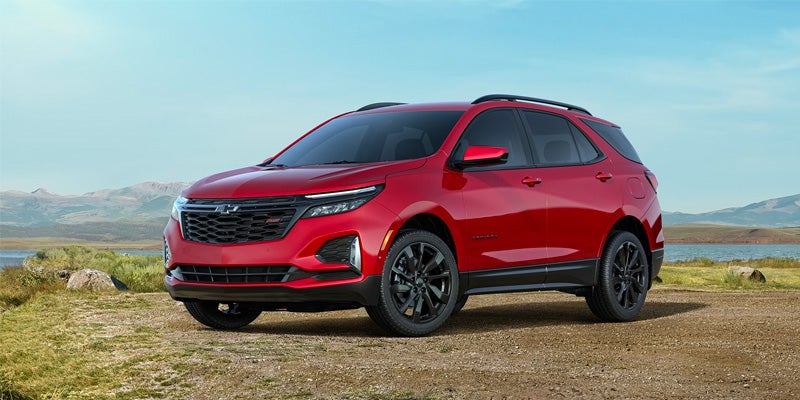 side view of red Chevy Equinox