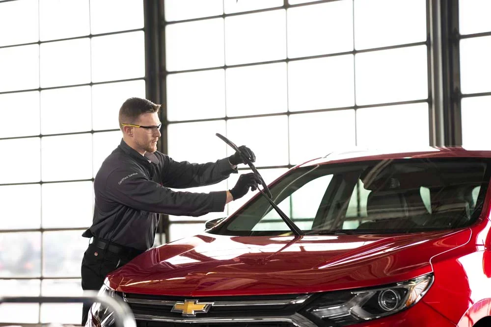 technician inspecting wipers